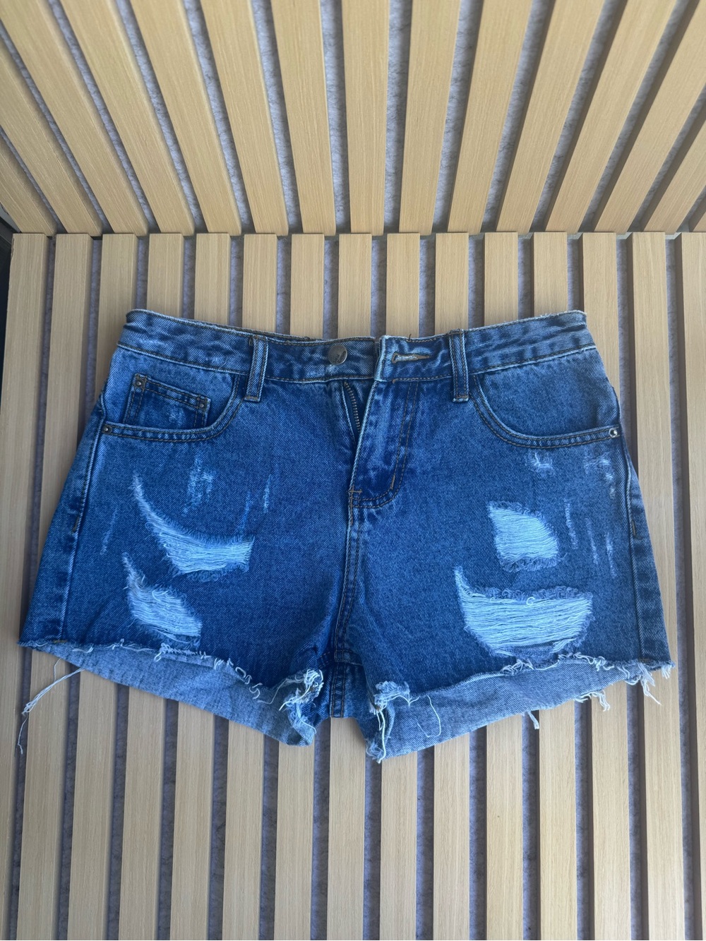 High-Rise Distressed Jean Shorts in Dark Blue